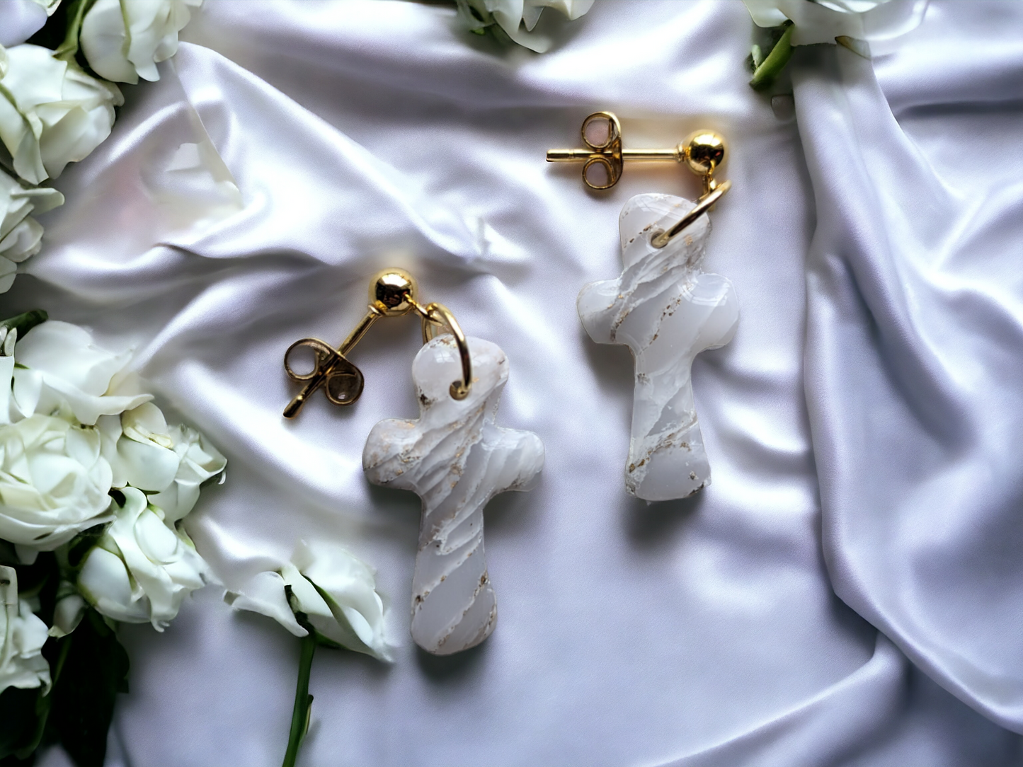 White-gold cross-shaped earrings