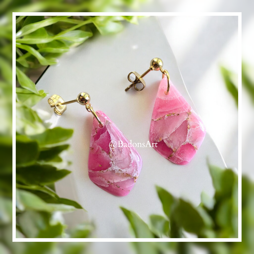 Elegant pink earrings with gold elements